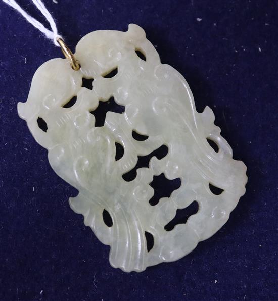 A Chinese carved pendant.